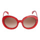 Lunettes de soleil Elsa Lee Paris, monture en plastique forme ronde rouge pailleté