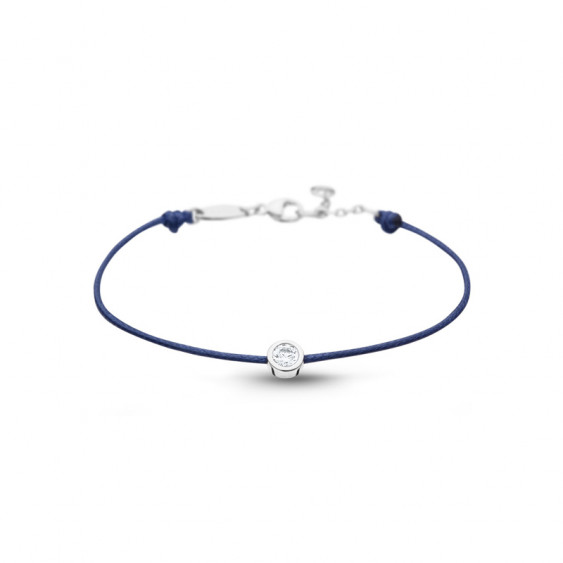 Clear Spirit bracelet from Elsa Lee Paris: one close set Cubic Zirconia on a blue cotton waxed lace