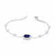 Bracelet habillé design traditionnel en argent bracelet pierre bleue saphir taille émeraude et entourage par Elsa Lee. 