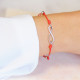 Bracelet Clear Spirit en argent rhodié signe infini sur cordon coton ciré rouge