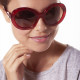 Lunettes de soleil Elsa Lee Paris, monture en plastique forme ronde rouge pailleté