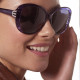 Elsa Lee Paris sunglasses, with a modern blue frame and transparent stripes