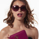 Elsa Lee Paris sunglasses, with a modern purple frame and transparent stripes