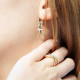 Asymmetrical dangle earrings cross yellow gold-plated Stella