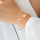 White pearl and yellow gold bangle in semi-open shape by Elsa Lee 