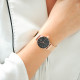 Thin Rose gold watch with black dial and milanese mesh bracelet by Elsa Lee Paris