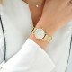 Thin gold metal bracelet watch with white dial and milanese mesh bracelet by Elsa Lee Paris 