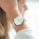 Simple and minimalist watch with its silver milanese mesh bracelet and white dial by Elsa Lee Paris 