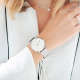 Simple and minimalist watch with its silver milanese mesh bracelet and white dial by Elsa Lee Paris 
