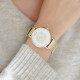 Gold coloured watch with its milanese mesh bracelet and white dial. Comes with a free leather bracelet for you to change