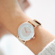 Rose gold watch with simple and geometric white dial design without hours numerals. Free leather bracelet comes with each purcha