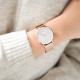 Rose gold geometrical design watch with white dial and rose gold milanese mesh bracelet 