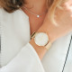 Montre cadran blanc et contour brillant bracelet dorée en maille milanaise. Bracelet cuir interchangeable offert
