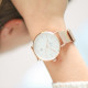 Clean style oversized watch white dial date fonction and rose gold bracelet in Milanese Mesh interchangeable