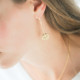 Boucles d'oreilles Arbre de Vie pendantes en argent plaqué or jaune par Elsa Lee Paris 