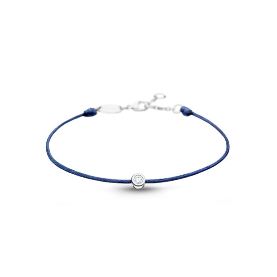 Clear Spirit bracelet from Elsa Lee Paris: one close set Cubic Zirconia 0,2ct on a blue cotton waxed lace