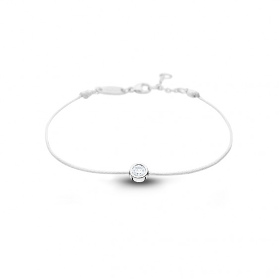 Clear Spirit bracelet from Elsa Lee Paris: one close set Cubic Zirconia on a black cotton waxed lace