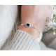 Bracelet habillé design traditionnel en argent bracelet pierre bleue saphir taille émeraude et entourage par Elsa Lee. 