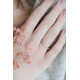 Thin silver ring with its pink cubics zirconia sets by Elsa Lee Paris 