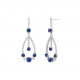 Boucles d'oreilles pendantes habillées avec des pierres bleues saphir en argent par Elsa Lee Paris 