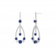 Dangling silver earrings with sapphire blue stones by Elsa Lee Paris, traditional design with a modern flair