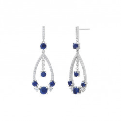 Dangling silver earrings with sapphire blue stones by Elsa Lee Paris, traditional design with a modern flair
