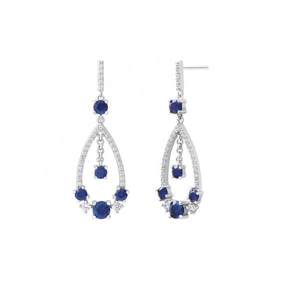 Dangling silver earrings with sapphire blue stones by Elsa Lee Paris, traditional design with a modern flair