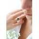Emerald green ring with its emerald cut cubic zirconia by Elsa Lee. Silver ring green stone square