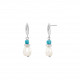 Dangling white baroque pearl earrings by French jewellery designer Elsa Lee Paris - white natural pearl earrings