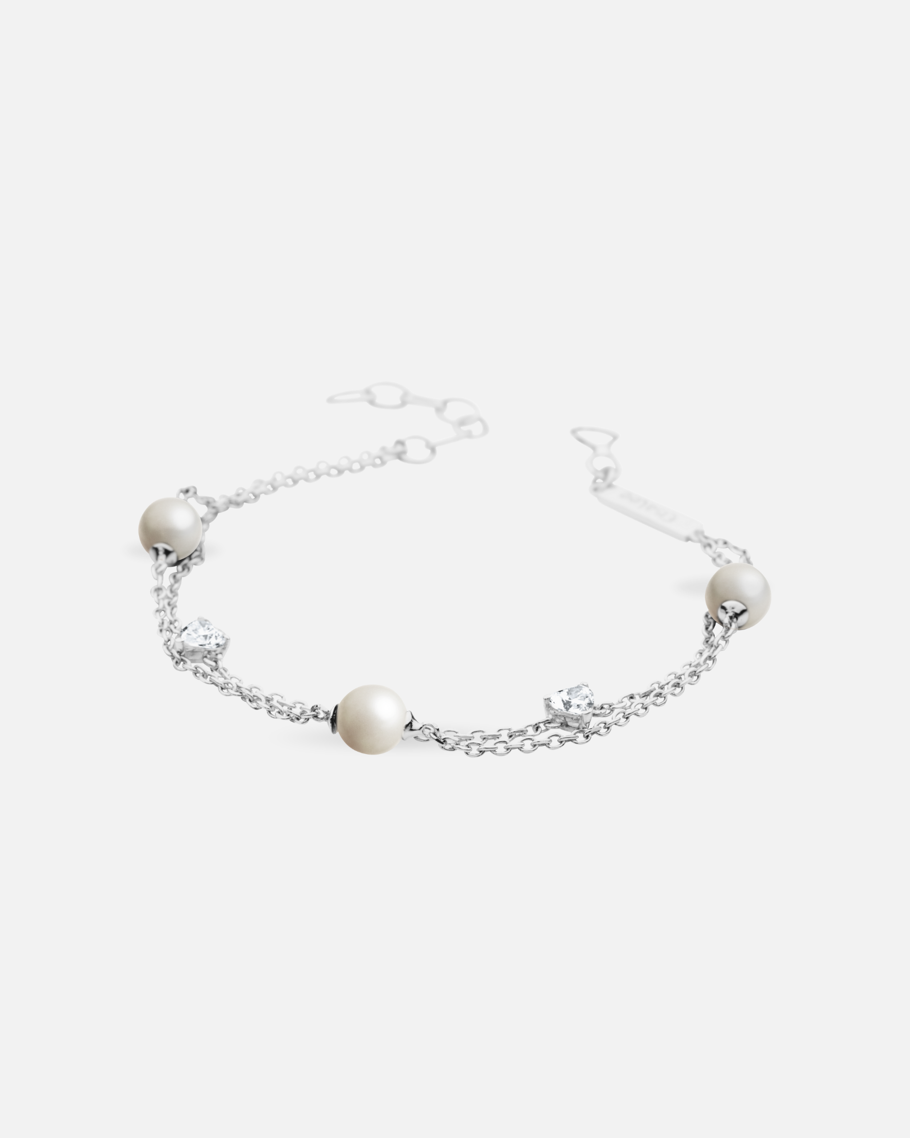 Bracelet chaîne et perles blanches Pureté